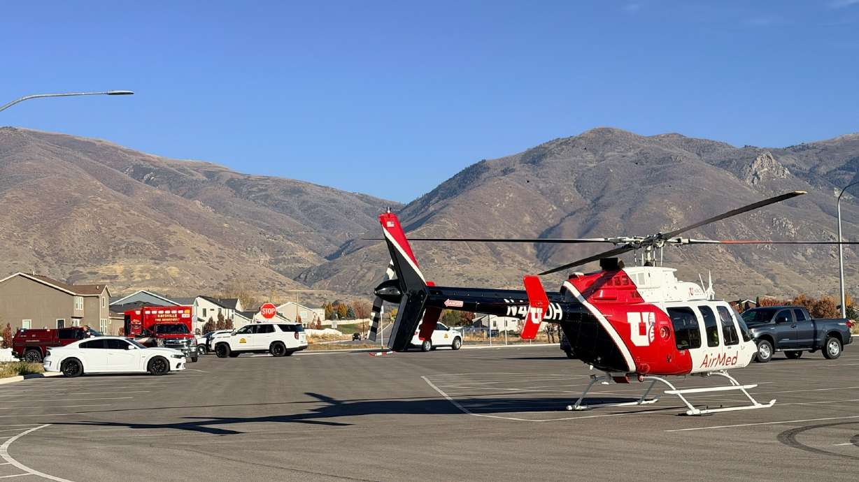 Medical helicopters transport a bicyclist to a hospital after a crash on a Kaysville trail on Tuesday.