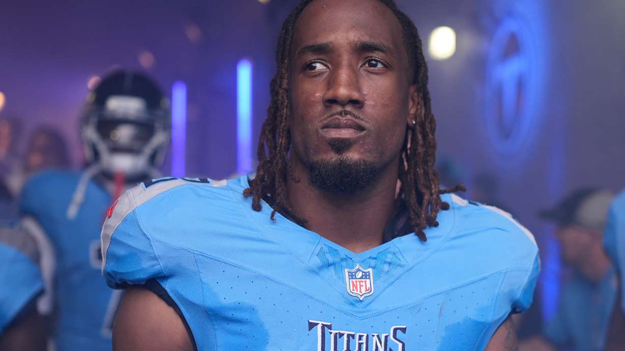 FILE - Tennessee Titans cornerback L'Jarius Sneed stands in the tunnel before an NFL football game against the Indianapolis Colts, Sept. 21, 2025, in Nashville, Tenn.