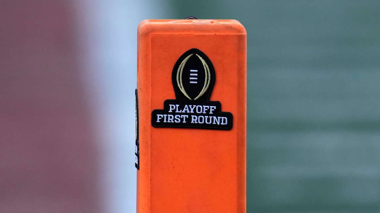 A playoff logo is seen on an end zone marker during the first half between Texas and Clemson in the first round of the College Football Playoff, Dec. 21, 2024, in Austin, Texas.