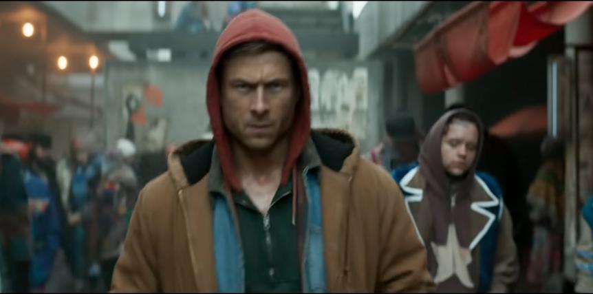 Review: 'The Running Man' is a neon-drenched, '80s throwback that knows exactly what it is