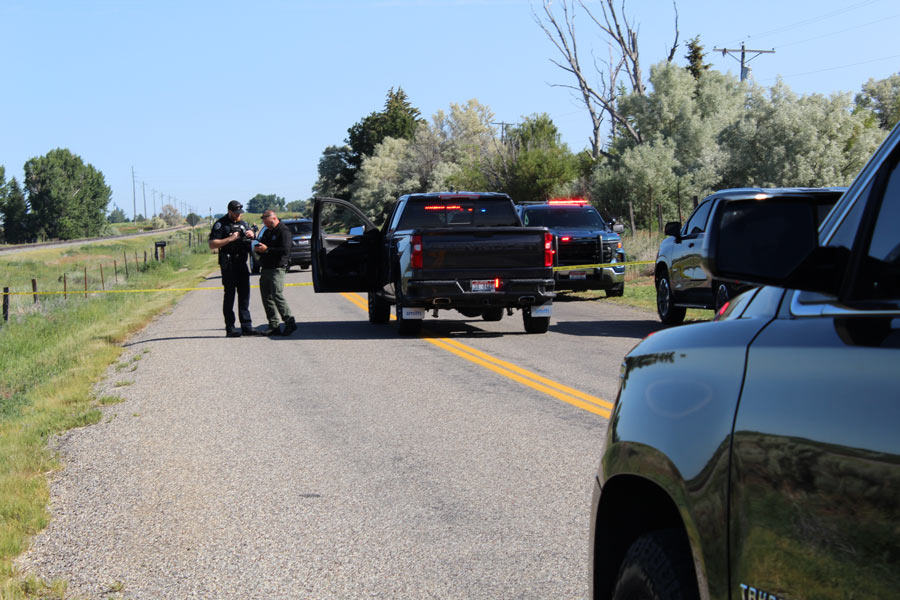 Police respond to a reported shooting near the West River Road Boat Ramp, June 23. Four people were indicted on charges related to the shooting on Friday.