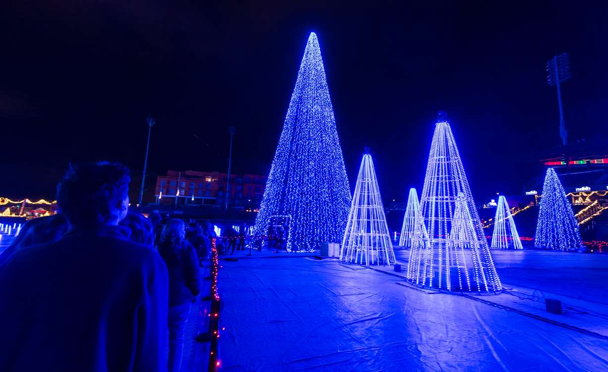 People view the Christmas lights as part of Holiday Lights at the Ballpark at America First Square in South Jordan on Friday.