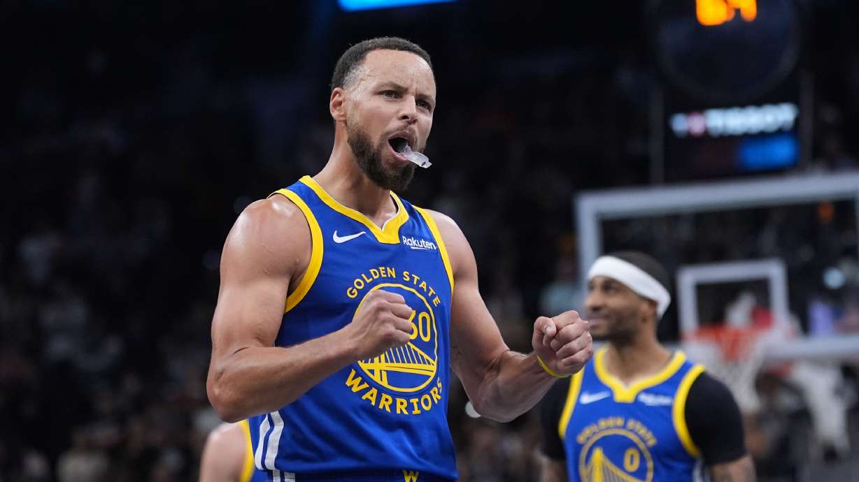 Golden State Warriors guard Stephen Curry (30) reacts after making a free-throw for the team's win over the San Antonio Spurs in an NBA Cup basketball game in San Antonio, Friday, Nov. 14, 2025.