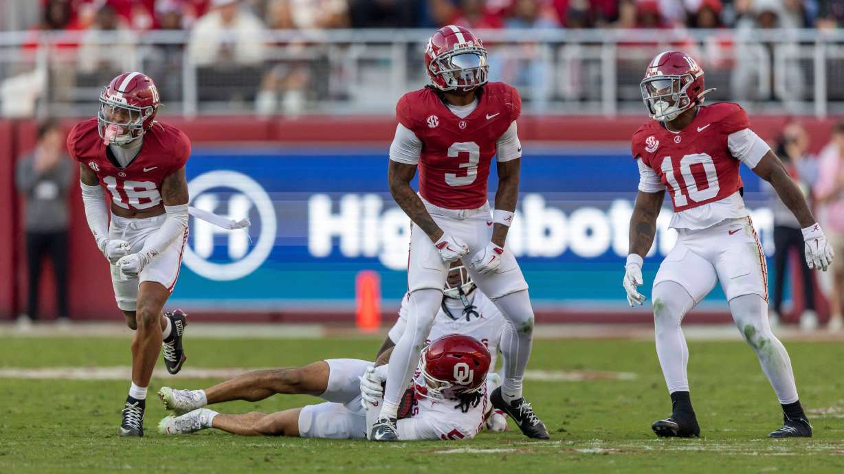 Alabama defensive backs Red Morgan (16) and Keon Sabb (3) and linebacker Justin Jefferson (10) celebrate a stop against Oklahoma during the first half of an NCAA college football game, Saturday, Nov. 15, 2025, in Tuscaloosa, Ala.