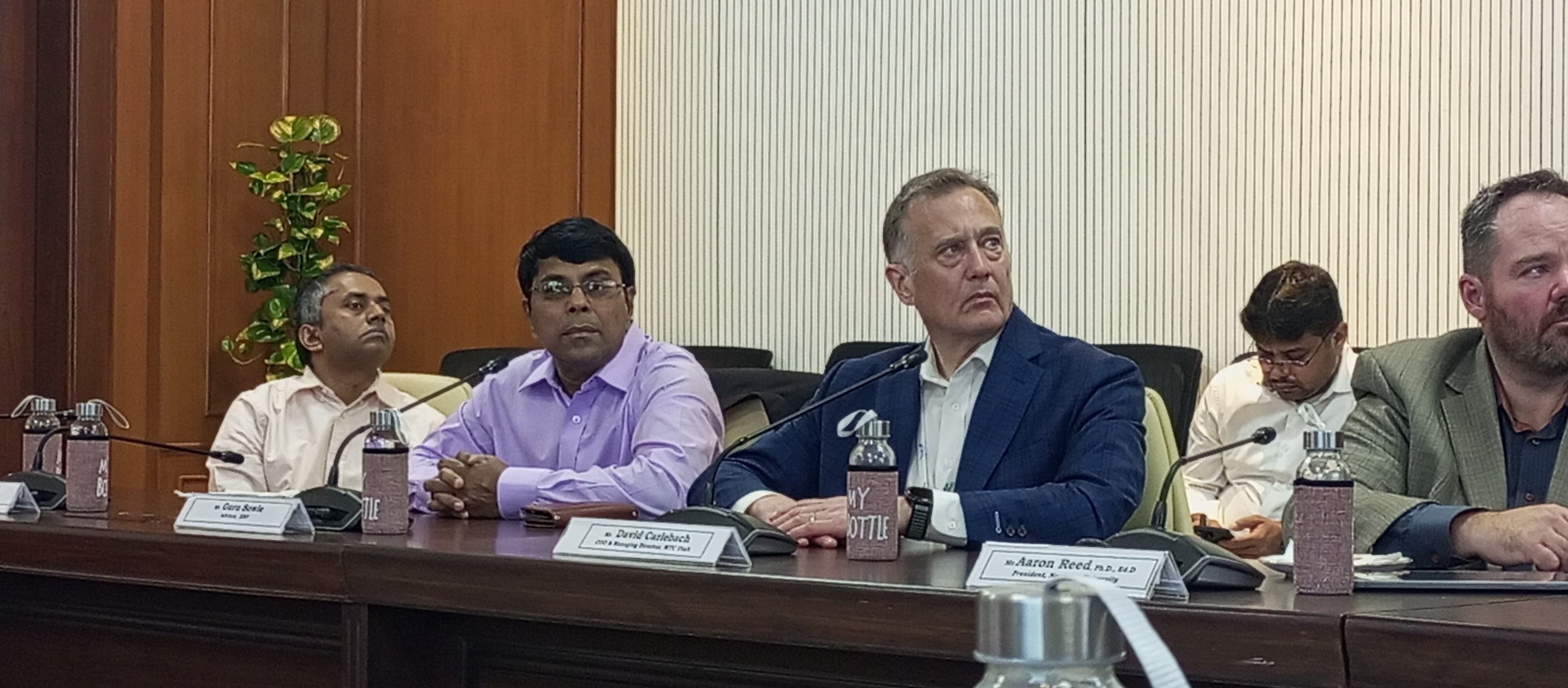 Guruprasad Sowle, the president and co-founder of Indus International Research Foundation, and David Carlebach, the COO of World Trade Center Utah, at a meeting with IMC Chamber of Commerce and Industry Mumbai on Nov. 4. Sowle said he expects the change in the H-1B visa policy to eliminate "average workers."