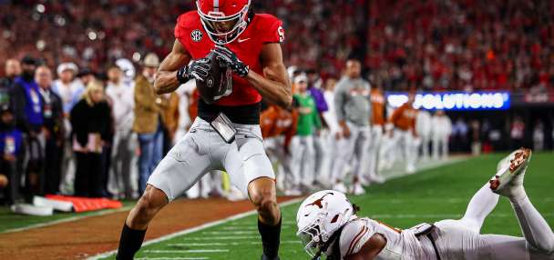 Stockton accounts for 5 touchdowns to outshine Manning as No. 5 Georgia beats No. 10 Texas 35-10