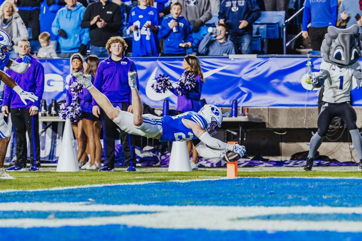 BYU safety Tanner Wall converts an interception into a touchdown during the second half of a Big 12 football game against TCU, Saturday, Nov. 15, 2025 at LaVell Edwards Stadium in Provo, Utah.