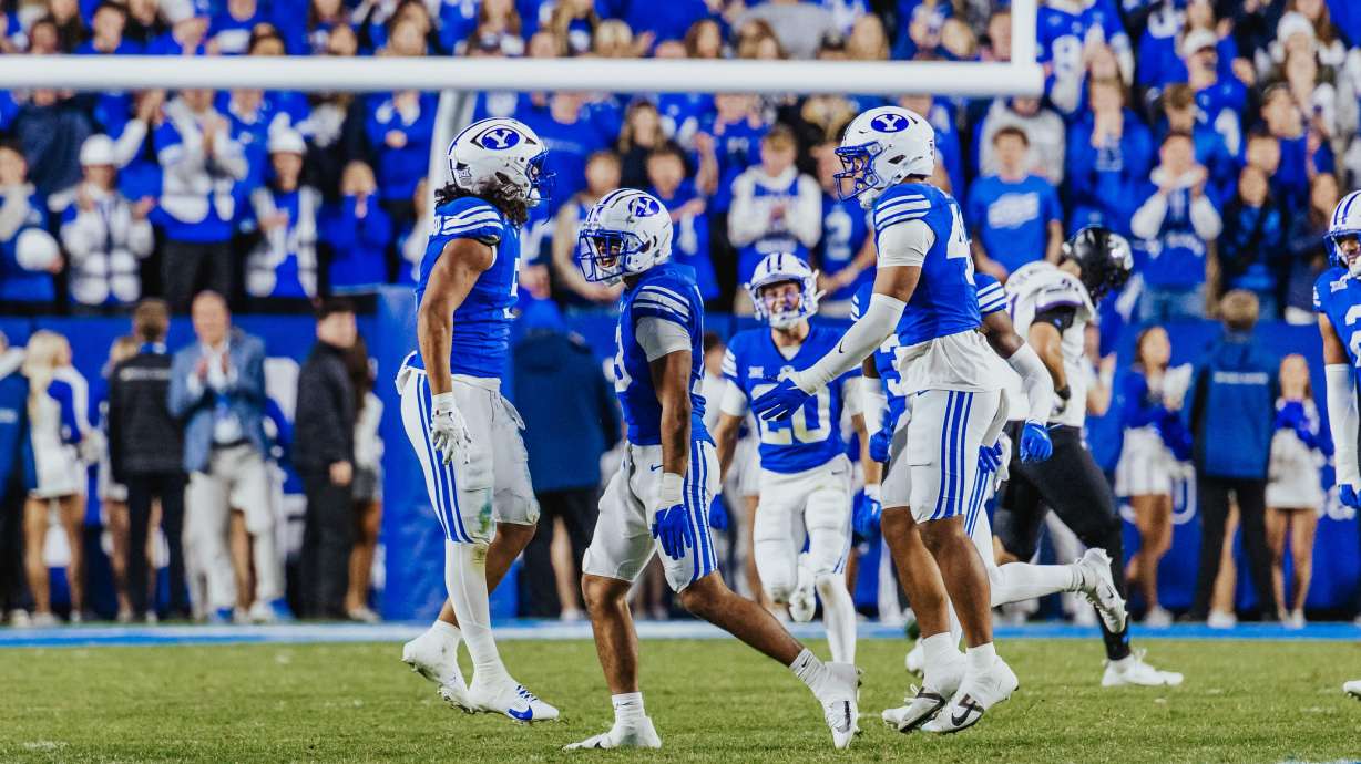 BYU defensive players celebrate a stop during the second half of a Big 12 football game against TCU, Saturday, Nov. 15, 2025 at LaVell Edwards Stadium in Provo, Utah.