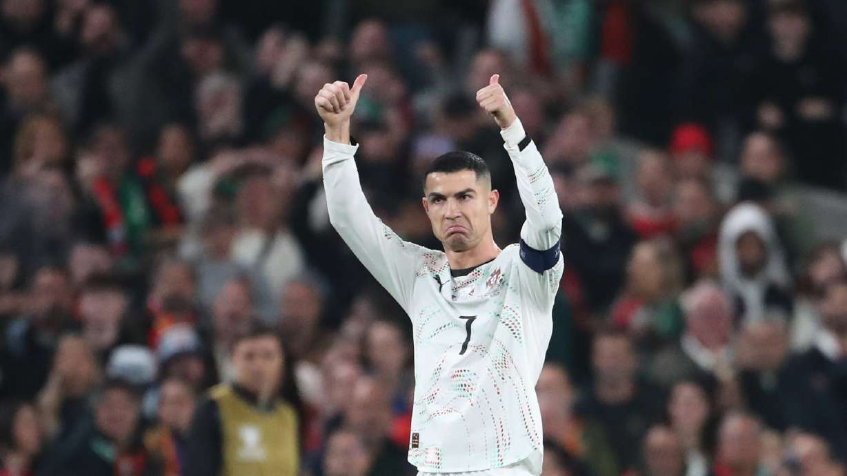 Portugal's Cristiano Ronaldo leaves the pitch after being shown a red card during a World Cup 2026 group F qualifying soccer match between Ireland and Portugal in Dublin, Thursday, Nov. 13, 2025.