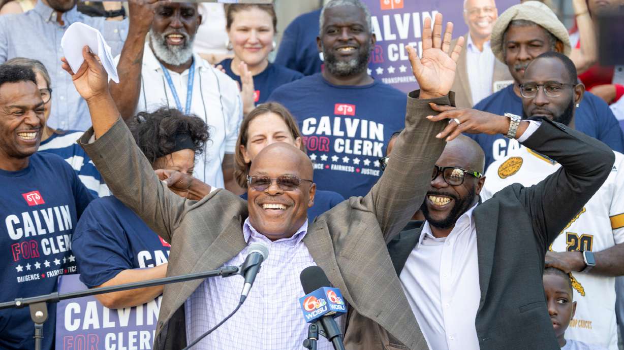 Calvin Duncan, center, stands with supporters on the steps of Orleans Parish Criminal Court to speak about his ambitions to be the next Clerk of Court, Oct. 2.
