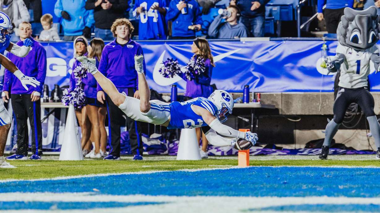 BYU safety Tanner Wall returns an interception for a touchdown during the second half of the Cougars' Big 12 football game against TCU, Saturday, Nov. 15, 2025 at LaVell Edwards Stadium in Provo, Utah.