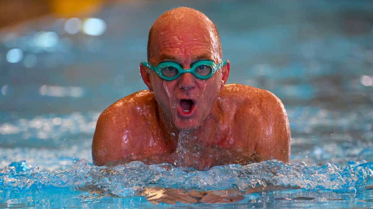 Former Olympic swimmer Rowdy Gaines swims, Tuesday, Nov 11, 2025 at a pool in Salt Lake City.