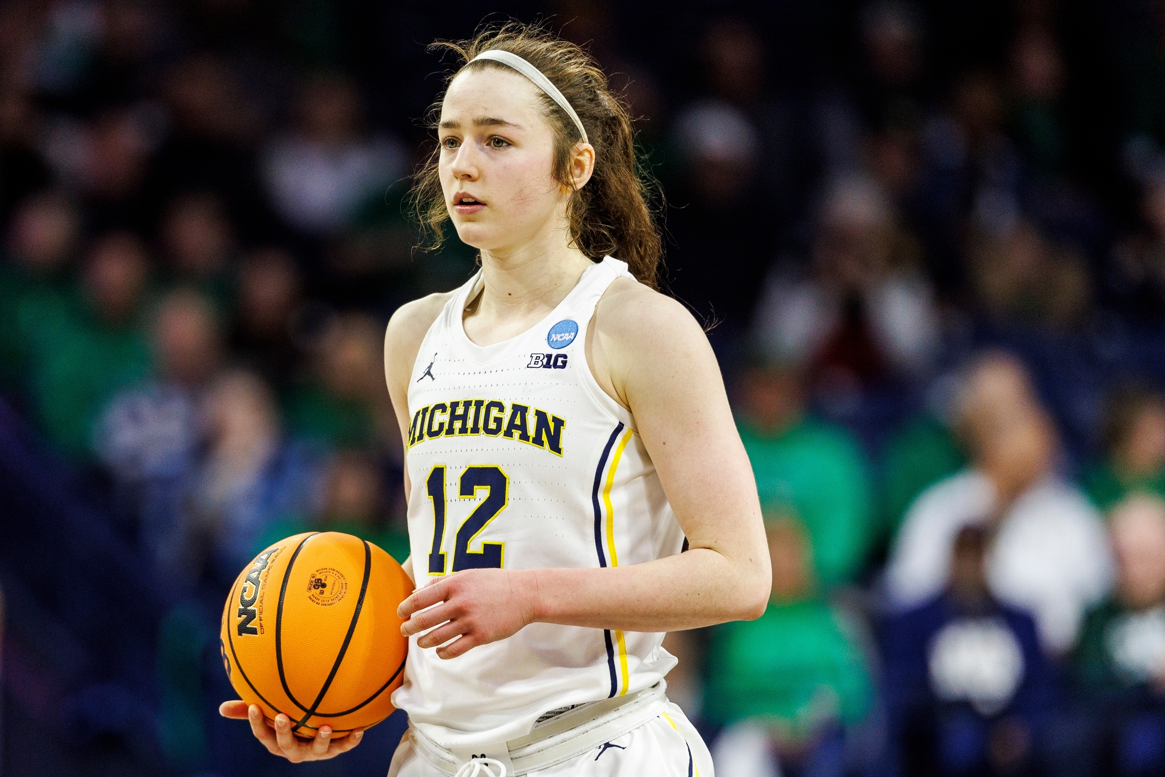 FILE - Michigan guard Syla Swords (12) controls the ball during the second half in the first round of the NCAA college basketball tournament against Iowa State, March 21, 2025, in South Bend, Ind.