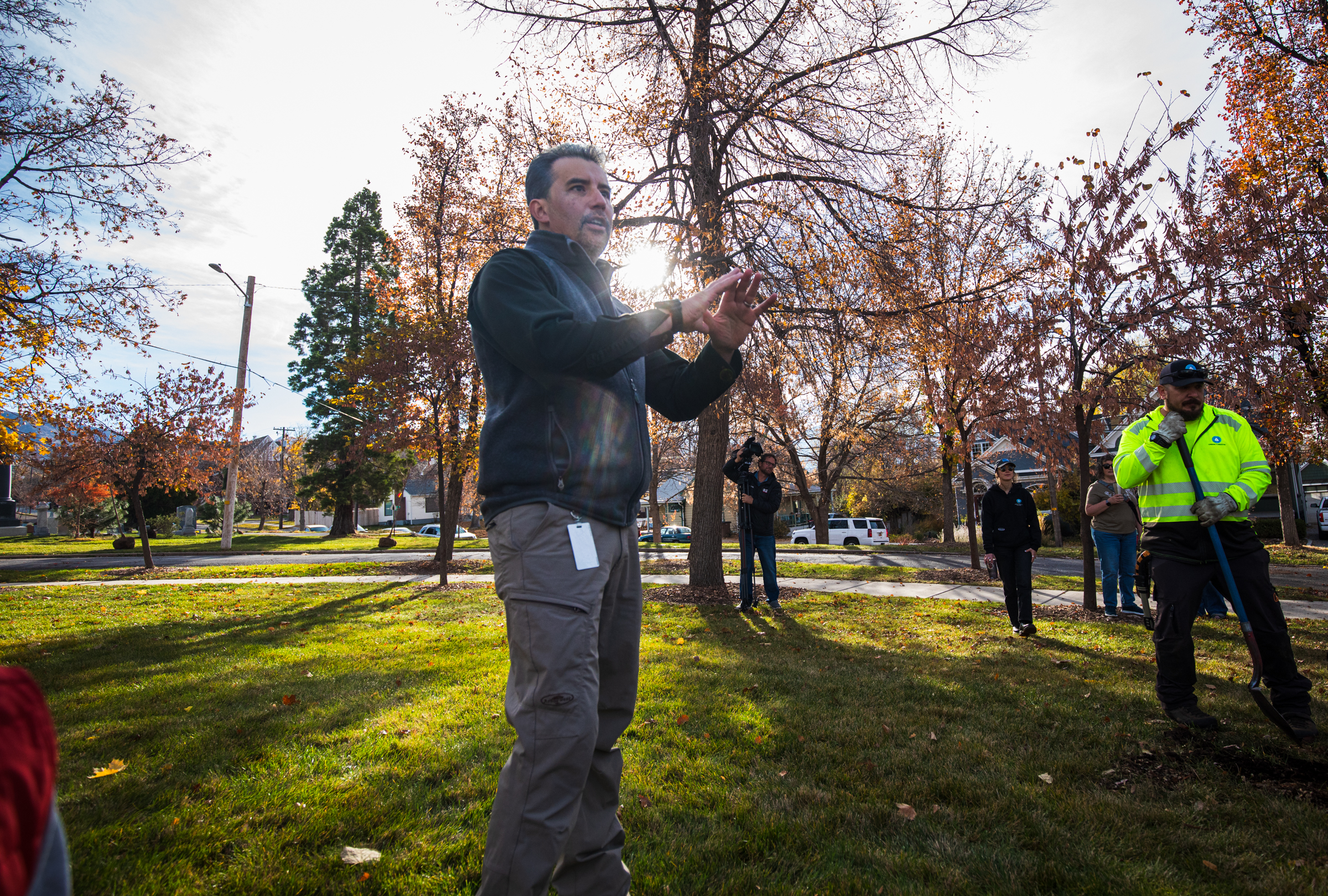 Tony Gliot, Salt Lake City's urban forester, speaks to volunteers during a tree planting event at the Salt Lake Cemetery on Saturday.