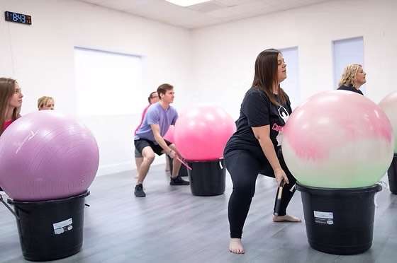 Locals participate in cardio drumming at Babes with Drums, taught by Karrie Hennigar, of St. George.