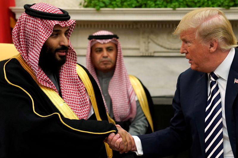 President Donald Trump shakes hands with Saudi Arabia's Crown Prince Mohammed bin Salman in the Oval Office at the White House in Washington, March 20, 2018. They met at the White House Tuesday.