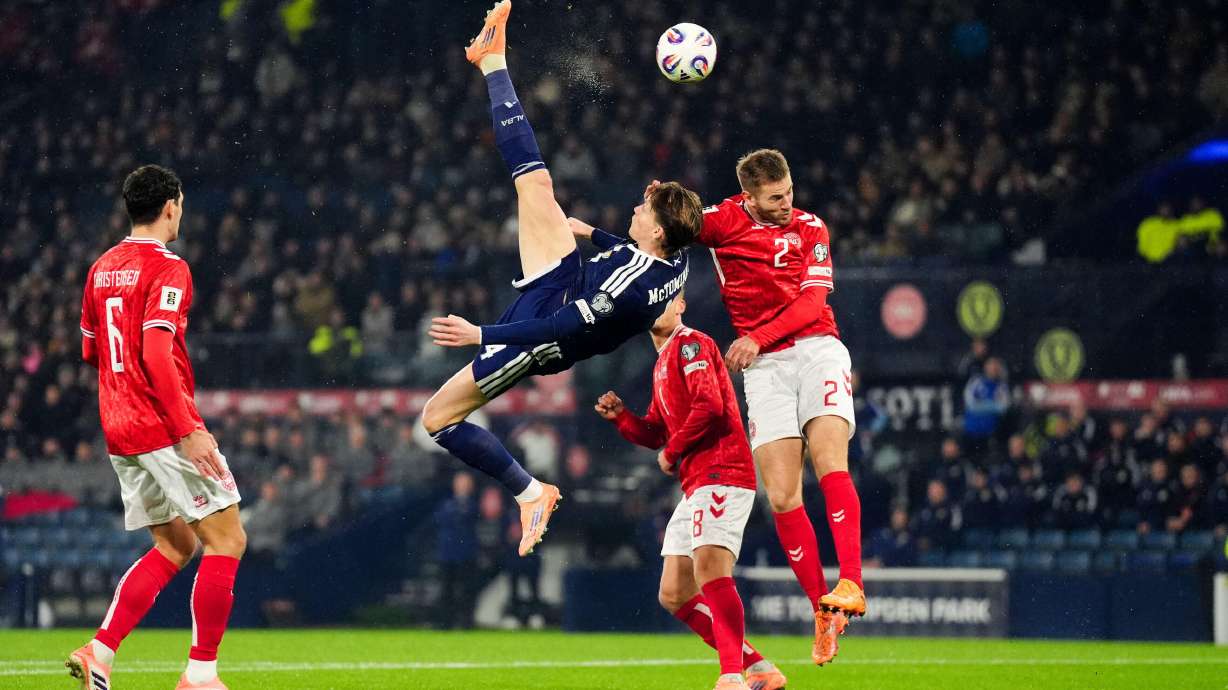 Scotland's Scott McTominay scores the opening goal with an overhead kick during the 2026 World Cup European Qualifying soccer match between Scotland and Denmark at Hampden Park, Glasgow, Scotland, Tuesday, Nov. 18, 2025.