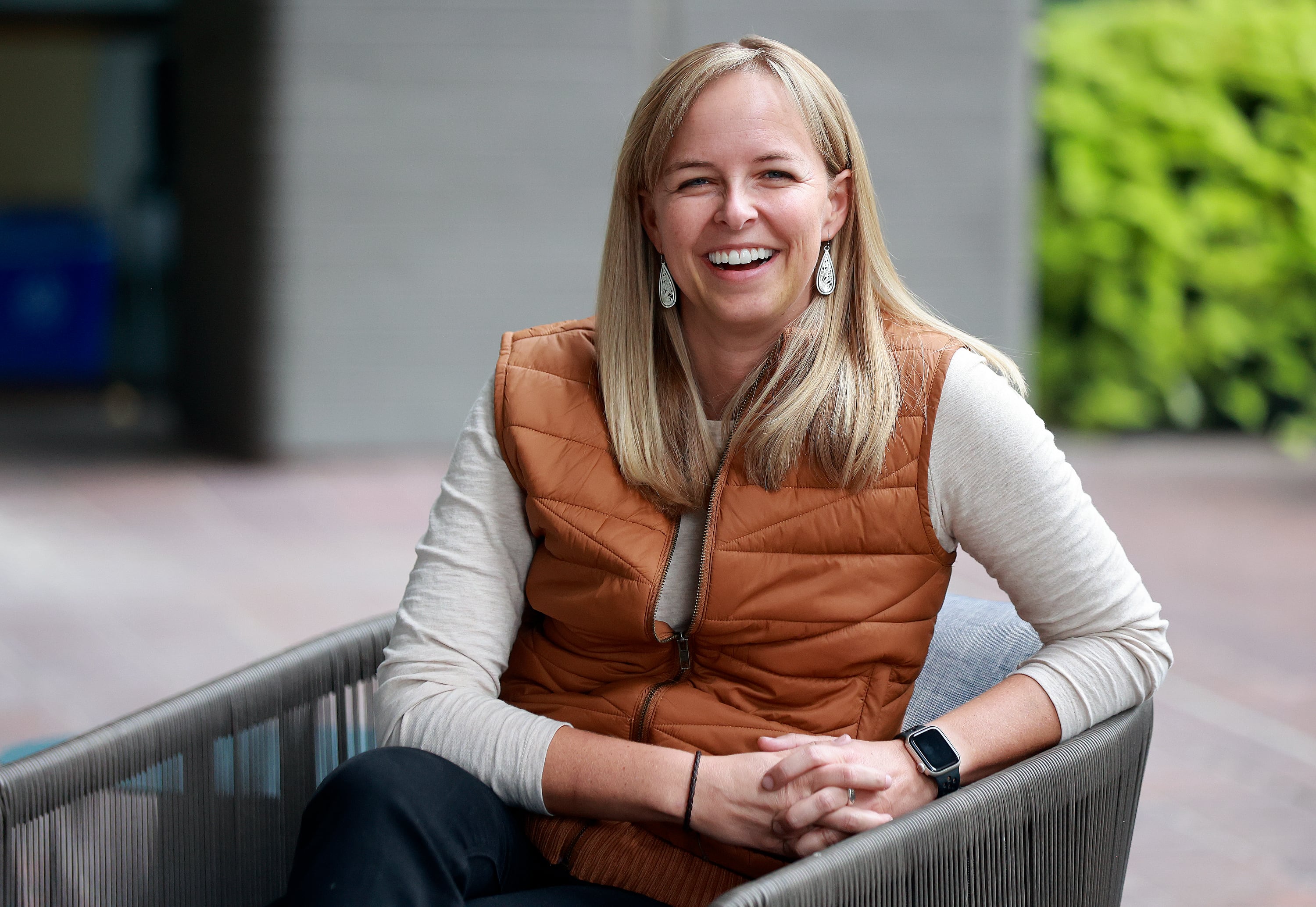 Kelsey Berg, Salt Lake City-Utah 2034 Organizing Committee for the Olympic and Paralympic Games government relations director, poses for a portrait outside of the organizing committee’s office in Salt Lake City on Oct. 22.