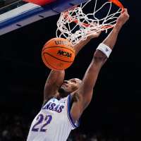 Saunders' career game rallies No. 13 BYU from 21-point deficit before loss to No. 14 Kansas