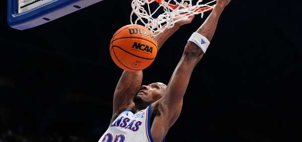 Saunders' career game rallies No. 13 BYU from 21-point deficit before loss to No. 14 Kansas