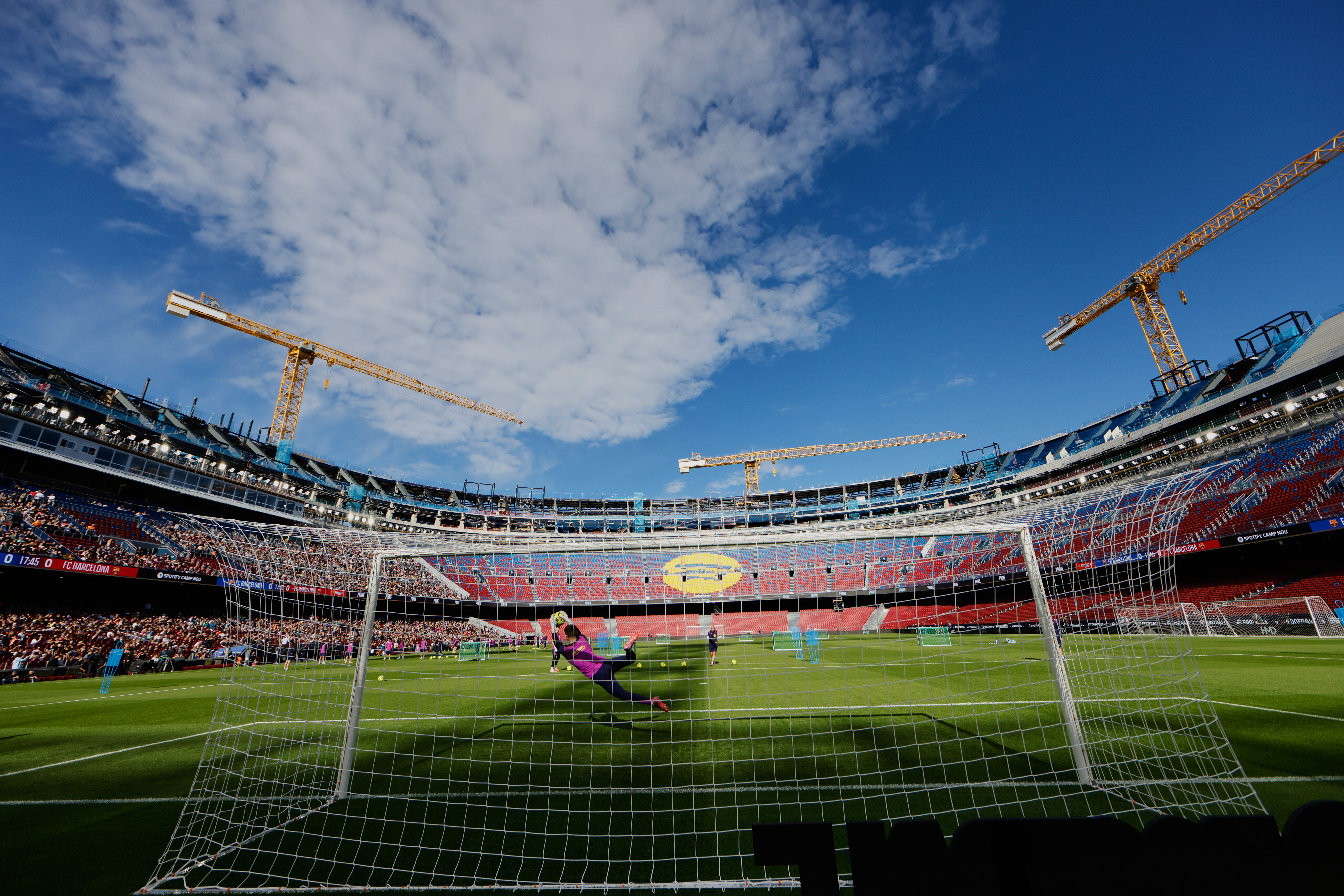 Barcelona's players exercise during the team's first training session at the venue after its renovation at the Camp Nou stadium in Barcelona, Spain, Friday, Nov. 7, 2025. 