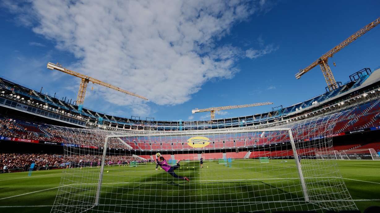 Barcelona's players exercise during the team's first training session at the venue after its renovation at the Camp Nou stadium in Barcelona, Spain, Friday, Nov. 7, 2025.