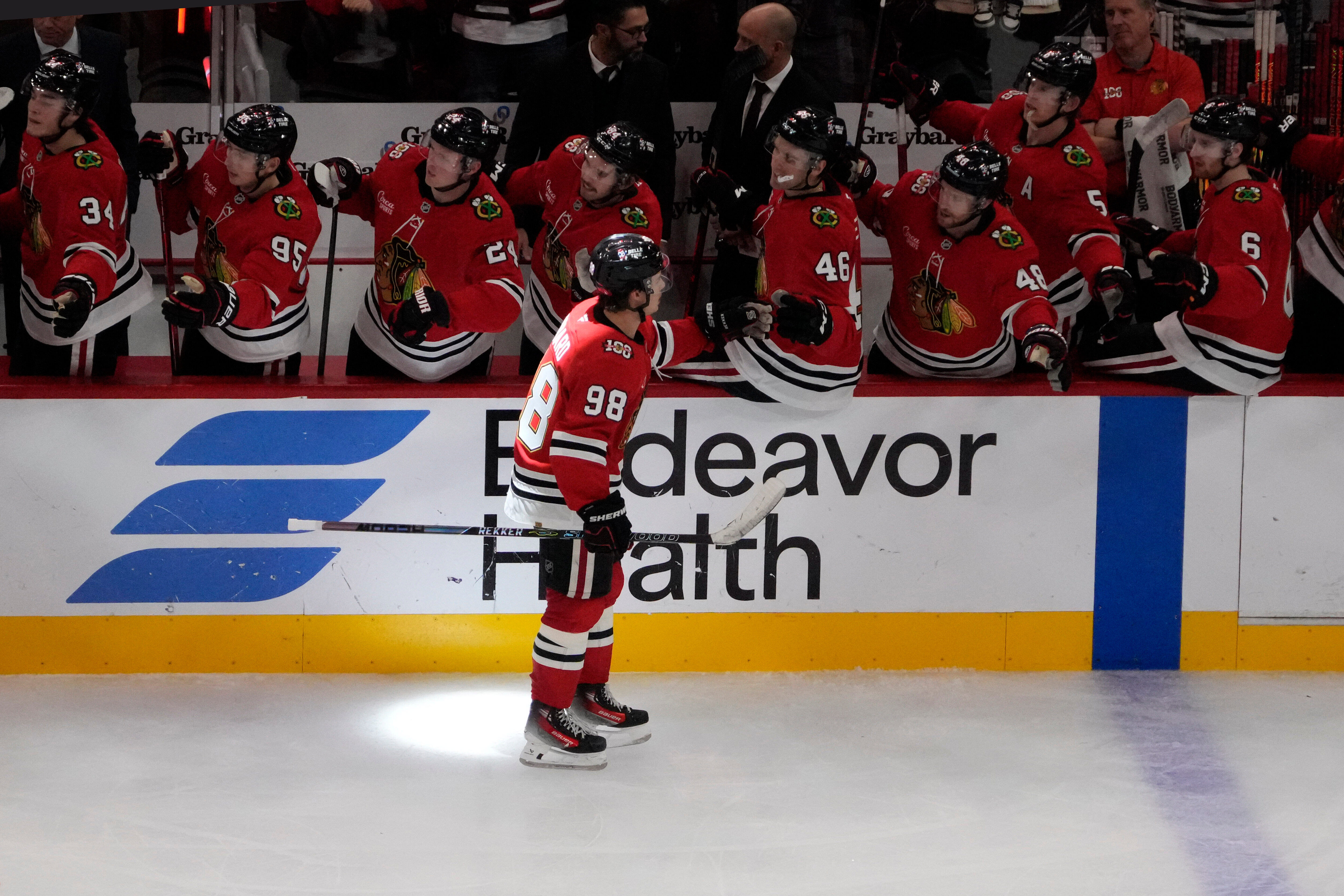 Chicago Blackhawks center Connor Bedard (98) celebrates his goal against the Calgary Flames during the third period of an NHL hockey game Tuesday, Nov. 18, 2025, in Chicago.