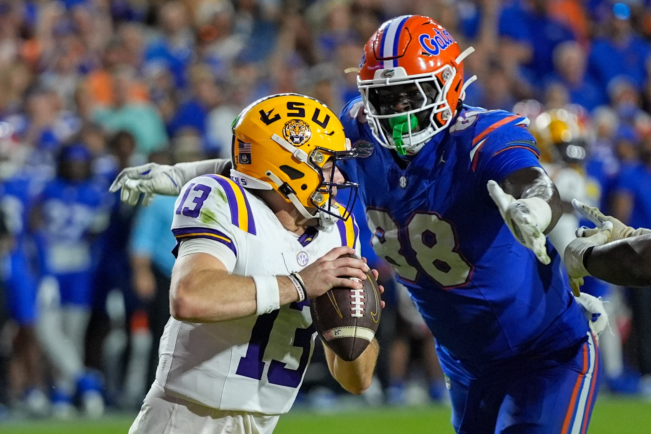 FILE - Florida defensive lineman Caleb Banks (88) sacks LSU quarterback Garrett Nussmeier (13) during the second half of an NCAA college football game, Saturday, Nov. 16, 2024, in Gainesville, Fla. 