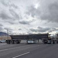 2 injured after vehicle is wedged under semitruck in Tooele County crash