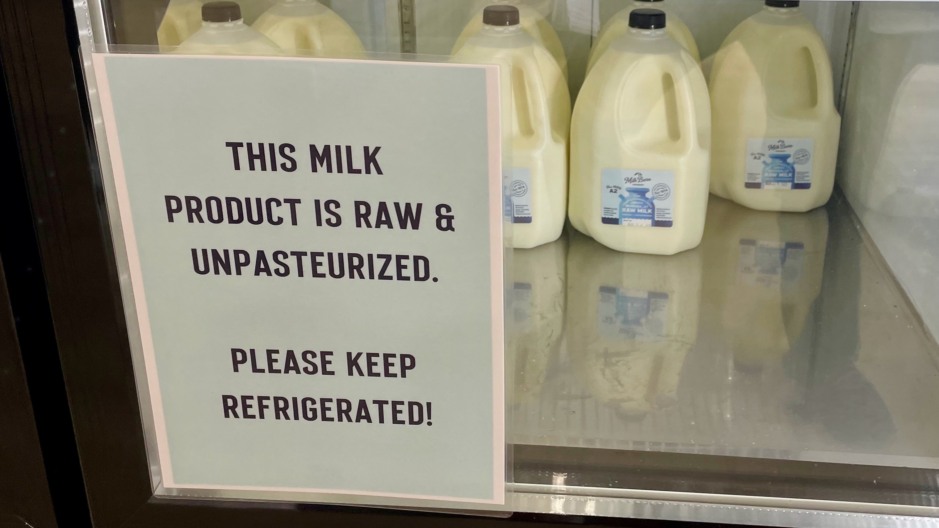 A new store in Ogden that sells raw milk, Milk Barn Creamery, faced a graffiti attack. Gallon jugs of milk at the store are pictured on Wednesday.
