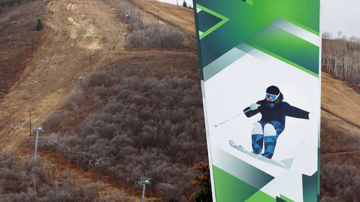 Muddy ski runs are pictured at the Utah Olympic Park in Park City on Wednesday. Utah's ski season is slated to officially begin this weekend, but the number of resorts pushing back their opening dates continues to grow over the lack of snow.