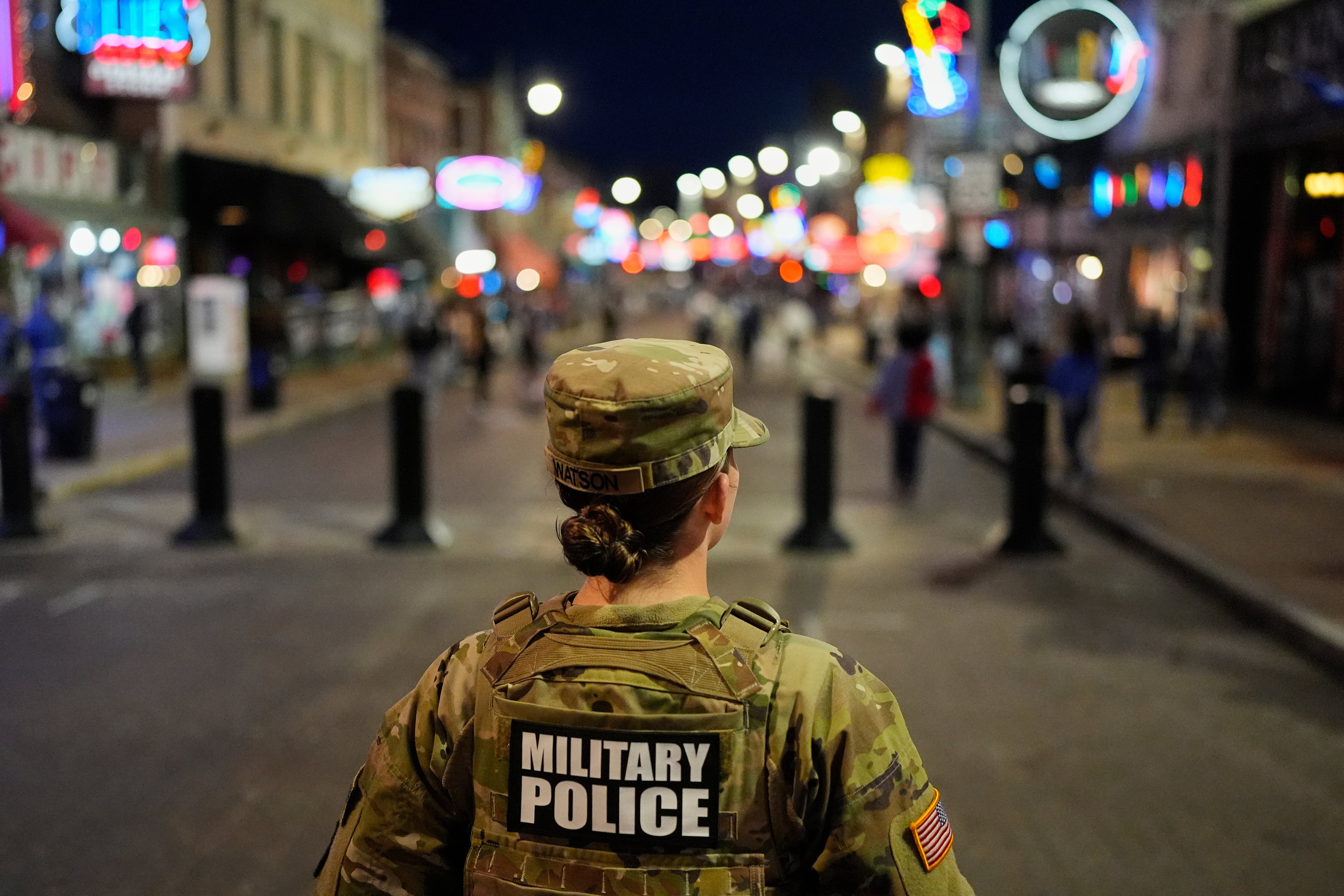A member of the National Guard stands watch on Beale Street, Oct. 24, in Memphis, Tenn.