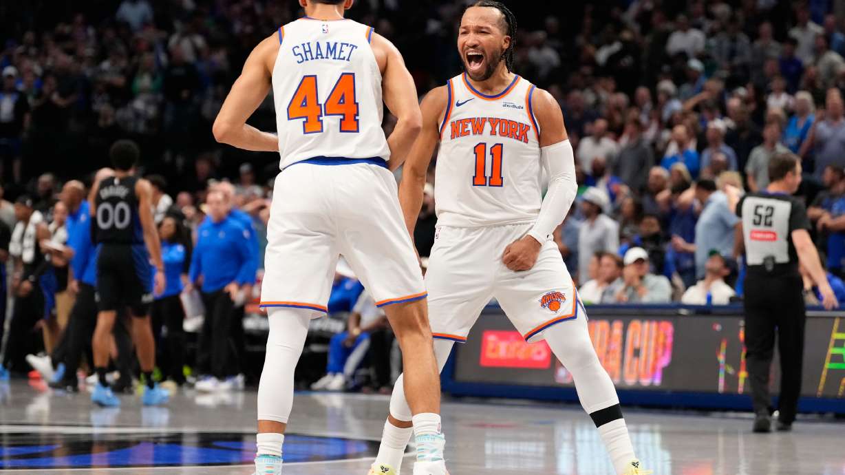 New York Knicks guard Jalen Brunson (11) celebrates with teammate Landry Shamet (44) in the second half of an NBA basketball game against the Dallas Mavericks Wednesday, Nov. 19, 2025, in Dallas.