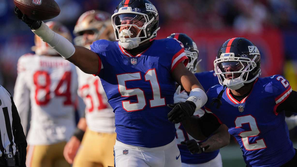 New York Giants linebacker Abdul Carter (51) reacts after recovering a fumble by the San Francisco 49ers during the second quarter of an NFL football game, Sunday, Nov. 2, 2025, in East Rutherford, N.J.