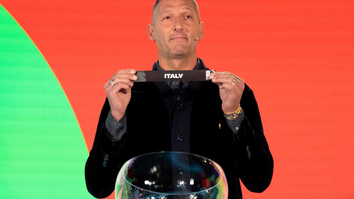 Marco Materazzi draws Italy during the FIFA World Cup 2026 playoff draw in Zurich, Switzerland, Thursday, Nov. 20, 2025.