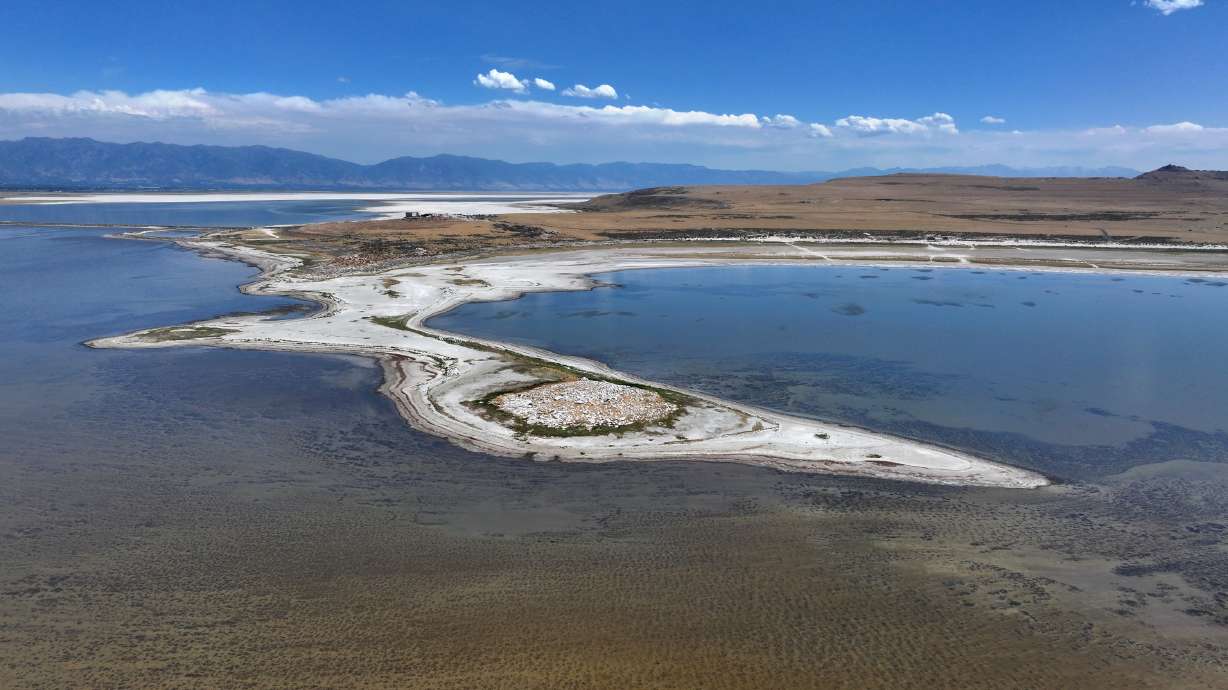 The Great Salt Lake and Antelope Island on July 29. The Great Salt Lake appears to have started its annual winter gains early after a rainy October, but state officials say the lake faces an uncertain winter and a long road to recovery ahead.