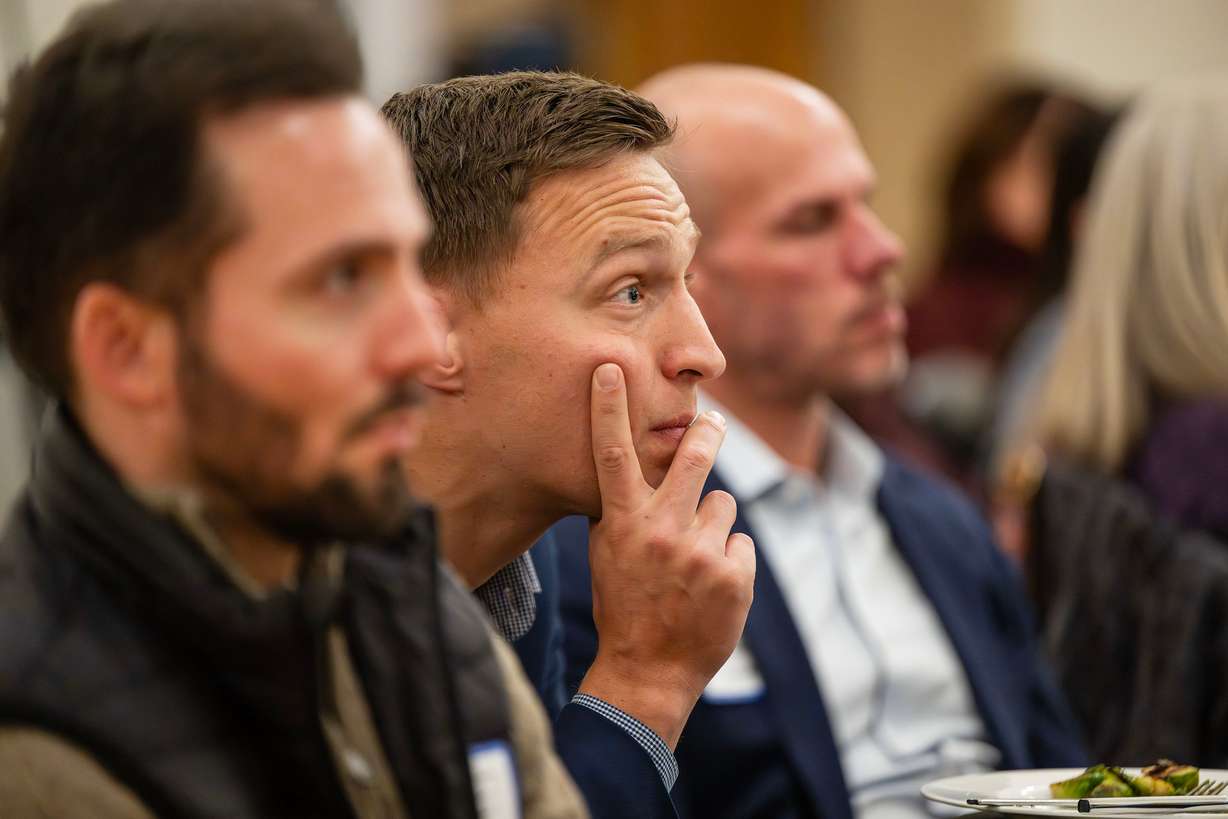 Audience members listen as Principles First holds a first-in-Utah dinner and discussion at the Clubhouse in Salt Lake City on Wednesday. Former presidential candidate John Kasich was one of the featured speakers.
