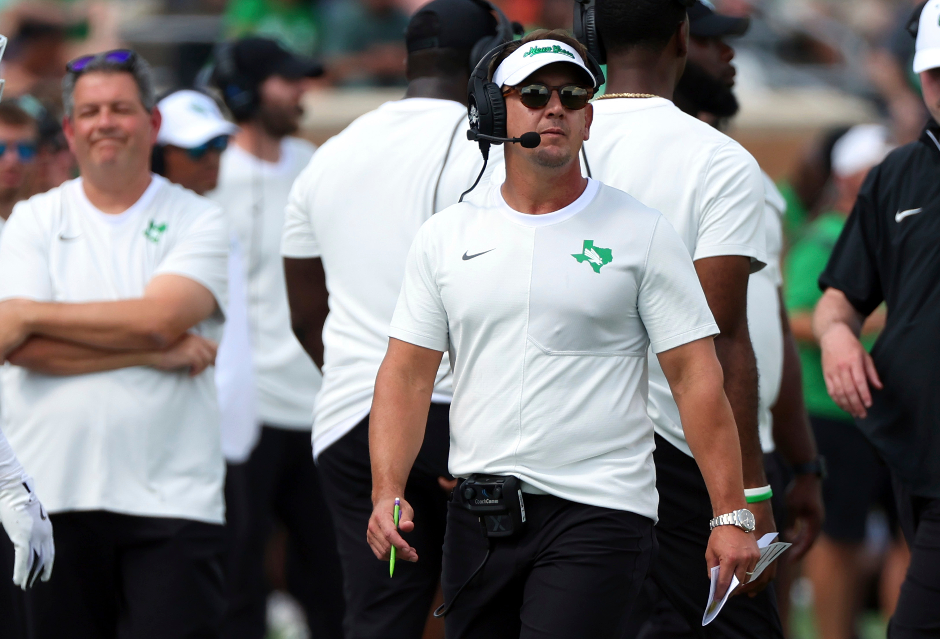 FILE - North Texas head coach Eric Morris walks the sideline during an NCAA college football game against Washington State, Sept. 13, 2025, in Denton, Texas. 