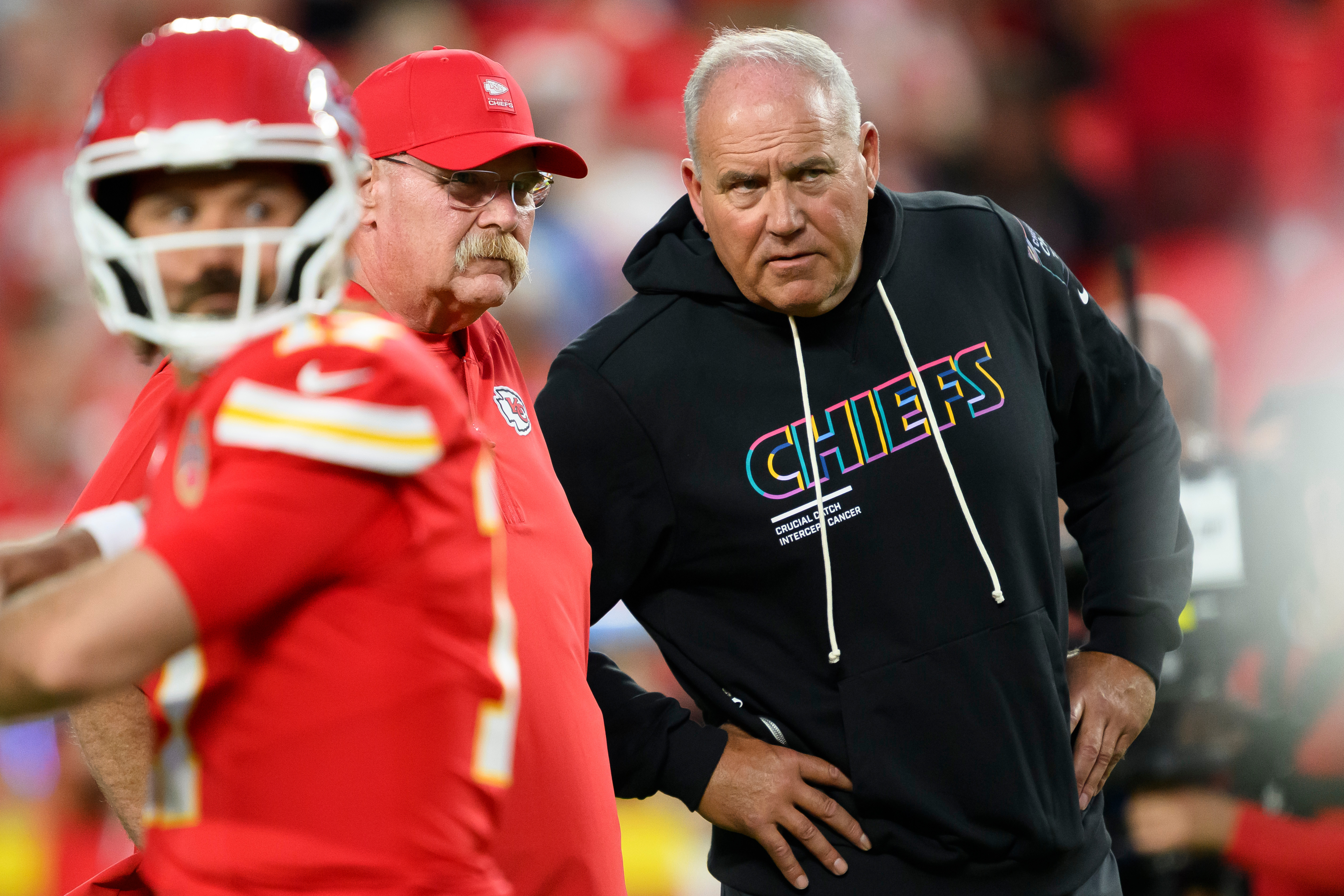 Kansas City Chiefs head coach Andy Reid, rear left, and special teams coordinator Dave Toub, right, confer during warmups before an NFL football game against the Detroit Lions, Sunday, Oct. 12, 2025 in Kansas City, Mo. 