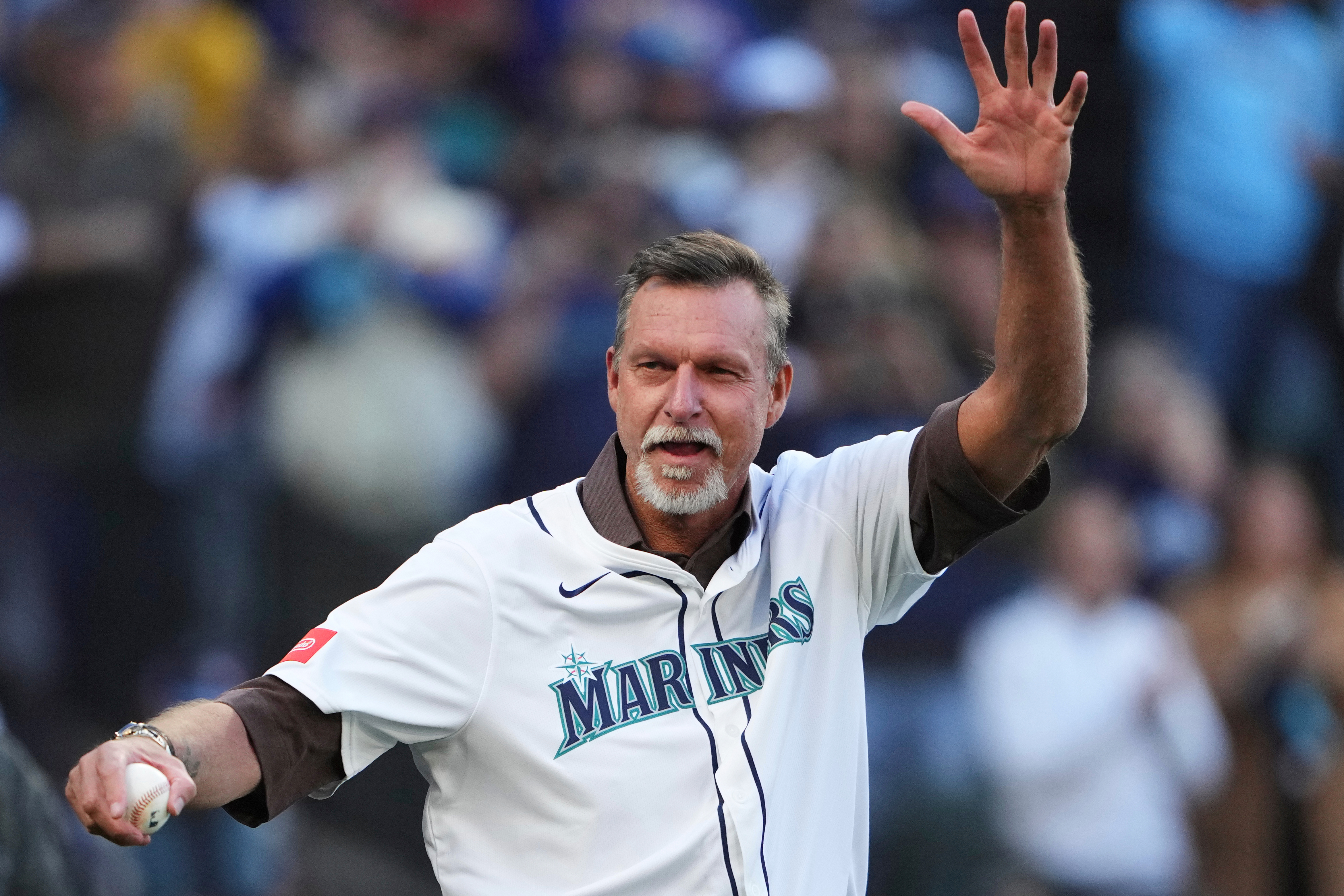 FILE - Baseball Hall of Fame and former Seattle Mariner Randy Johnson waves prior to Game 3 of baseball's American League Championship Series against the Toronto Blue Jays, Wednesday, Oct. 15, 2025, in Seattle.