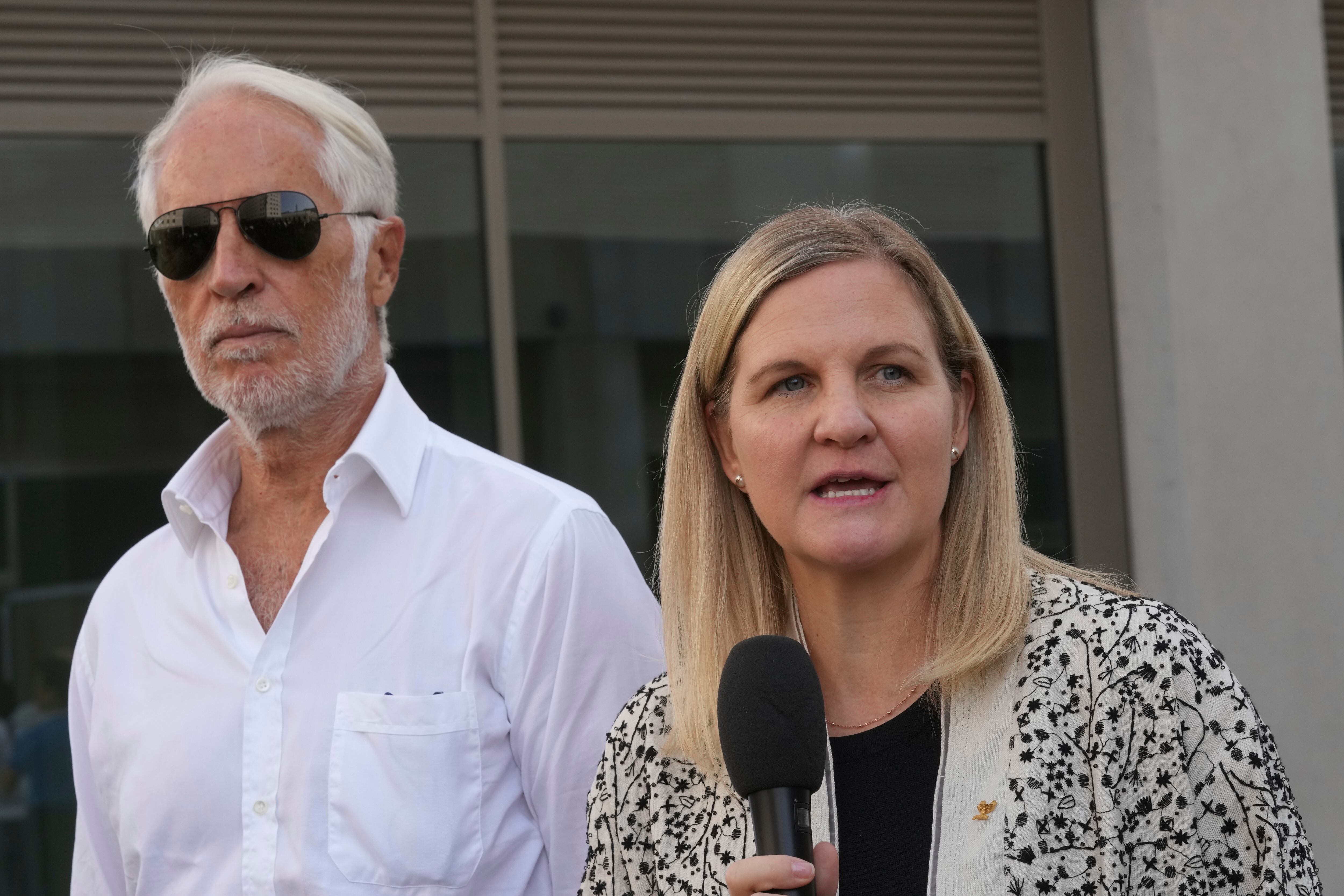 IOC President Kirsty Coventry, right, and Milano Cortina 2026 Foundation President Giovanni Malago visit the Olympic and Paralympic Village in Milan, Italy, Sept. 18. Coventry addressed the United Nations on Thursday, urging the countries to uphold the Olympic Truce.