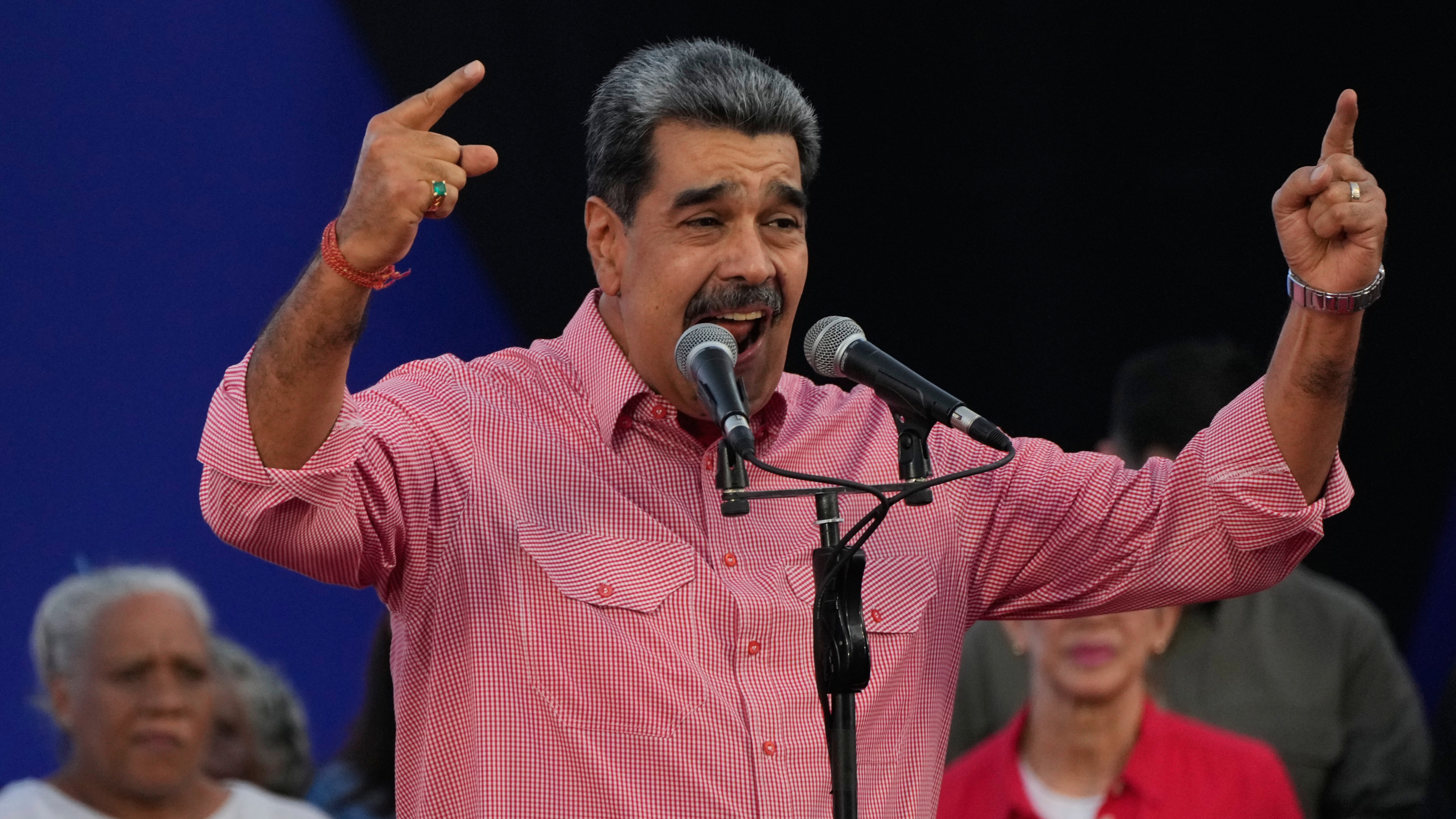 Venezuelans in Utah say they back Trump administration pressure tactics targeting Venezuelan President Nicolás Maduro and his regime. Maduro is pictured in the Petare neighborhood of Caracas, Venezuela, on Nov. 15.