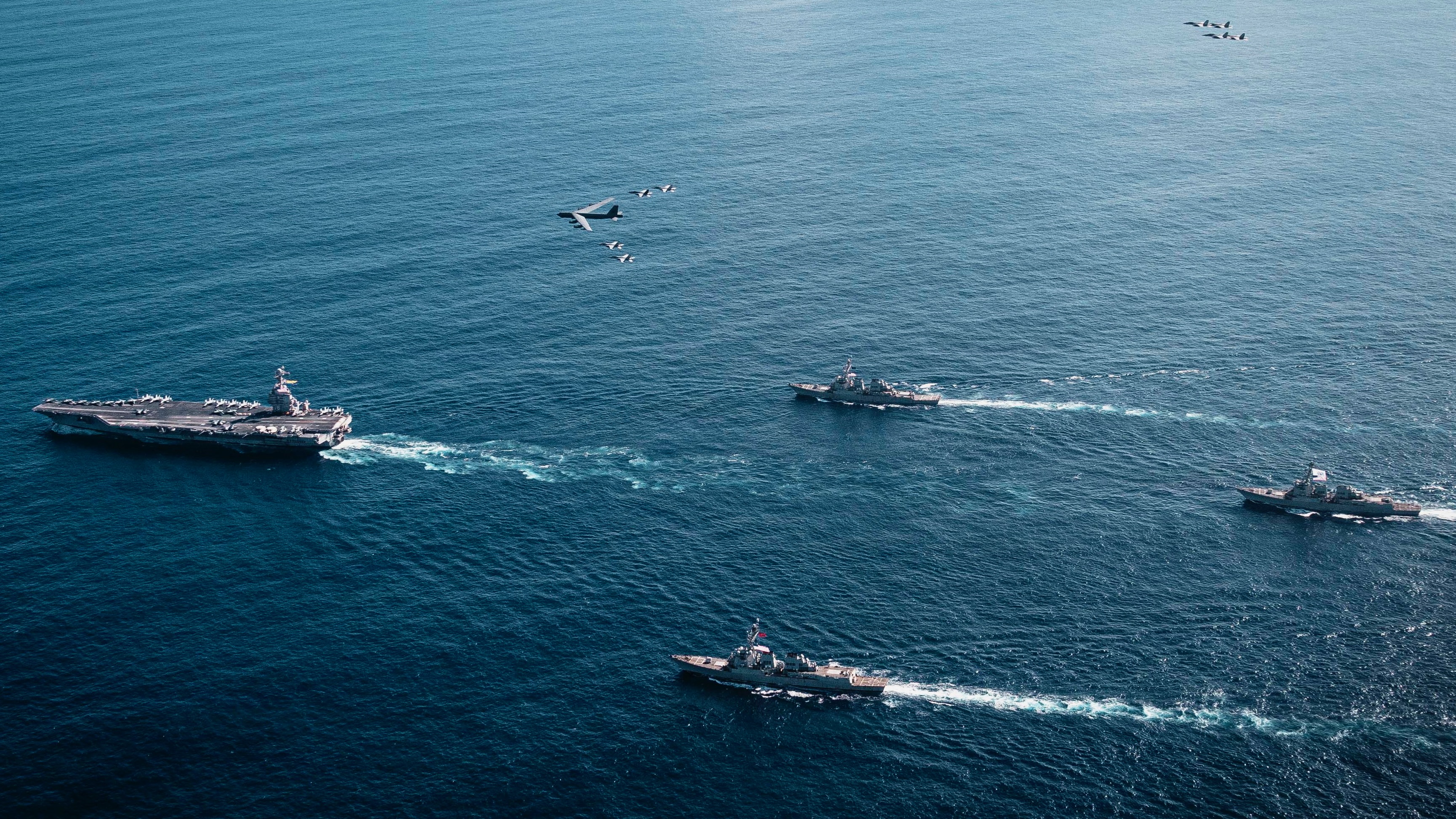 The Nov. 13, photo shows the USS Gerald R. Ford aircraft carrier, left, and other elements of the U.S. Navy's Gerald R. Ford Carrier Strike Group. The strike group entered the Caribbean Sea on Nov. 16, as part of Trump Administration moves targeting drug trafficking in the zone.
