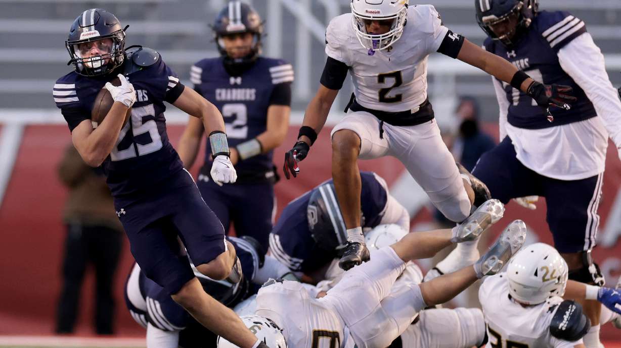 Corner Canyon and Lone Peak compete in the 6A football state championship game at Rice-Eccles Stadium in Salt Lake City on Thursday, Nov. 20, 2025.