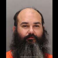 Police: Idaho man arrested after telling 911 he killed friend in assisted suicide at Boise hotel