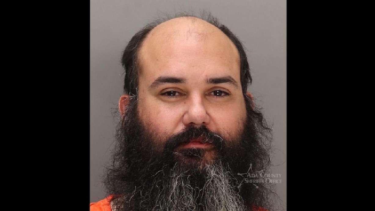 Brian Jones was arrested after police said he called 911 early Thursday morning claiming he had killed his friend inside a Boise hotel room.