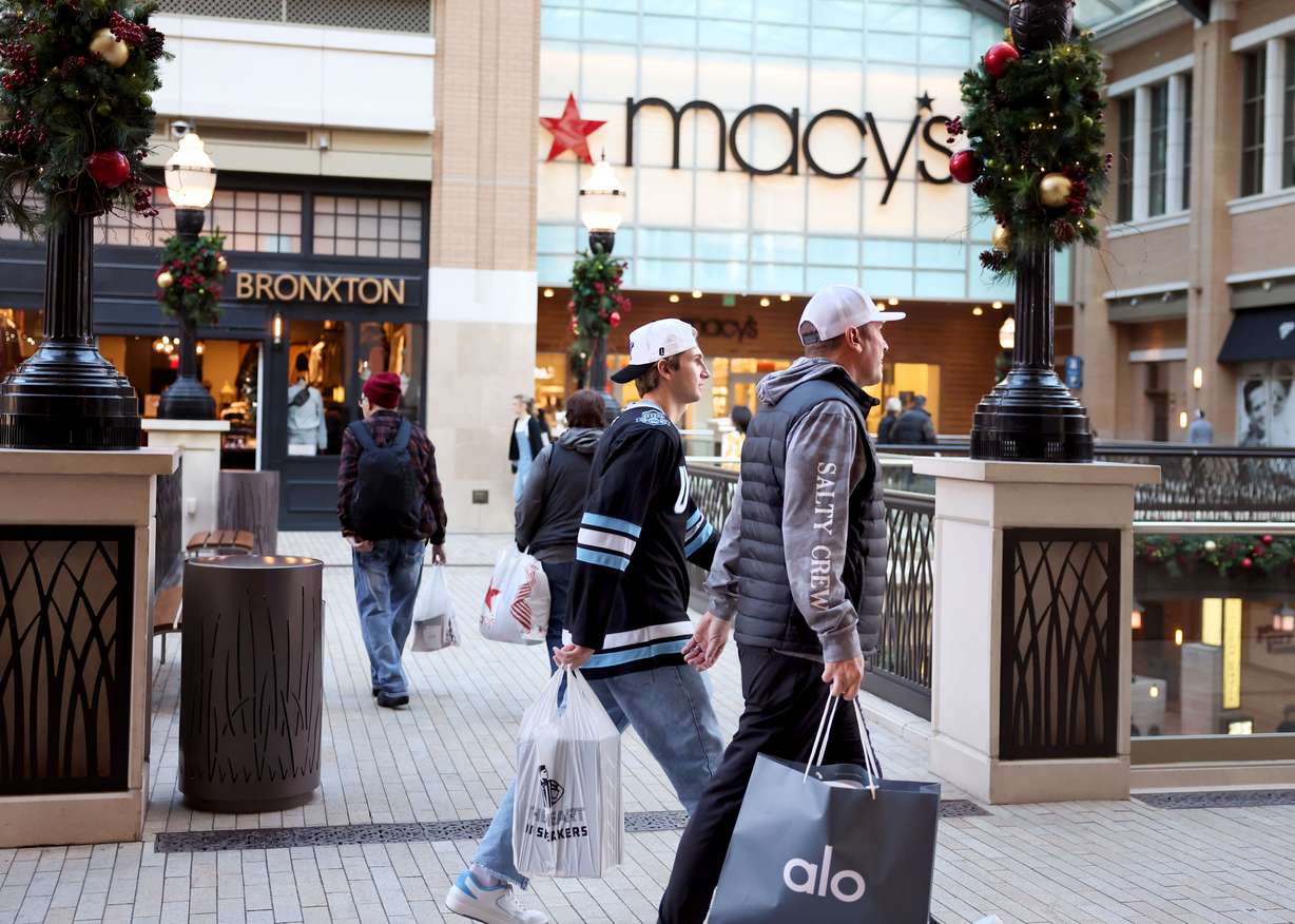 Shoppers walk through City Creek Center in Salt Lake City on Friday, Nov. 29, 2024.