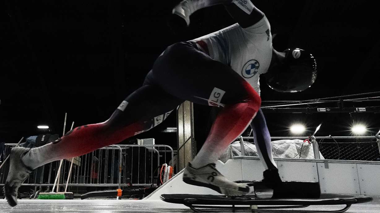 South Korea's Jung Seunggi takes the start at a training session ahead of a three day skeleton and bobsled World Cup stage and Olympic test event in Cortina D'Ampezzo, Italy, Wednesday, Nov. 19, 2025.