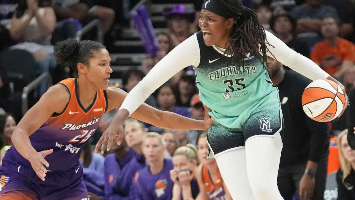 FILE - New York Liberty center Jonquel Jones (35) looks for an outlet against Phoenix Mercury forward Alyssa Thomas (25) during the second half of Game 1 during the first round of the WNBA basketball playoffs Sunday, Sept. 14, 2025, in Phoenix.