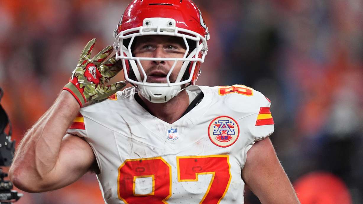 Kansas City Chiefs tight end Travis Kelce celebrates after scoring during the second half an NFL football game against the Denver Broncos Sunday, Nov. 16, 2025, in Denver.